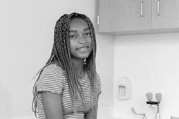 Girl sitting on exam room table