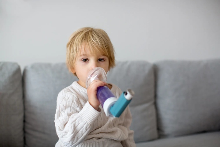 child using inhaler