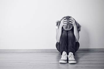 girl sitting on floor