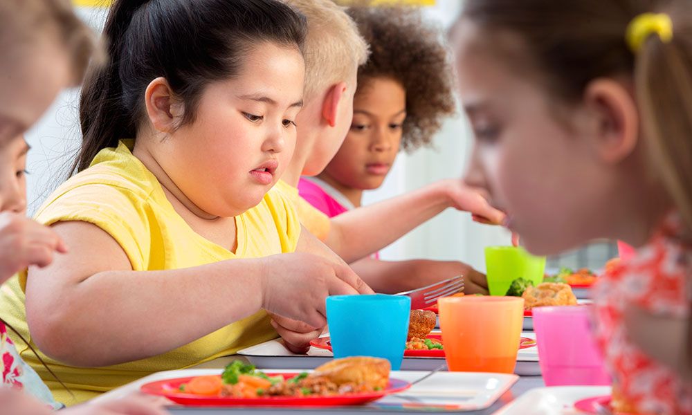 girl at lunch table.