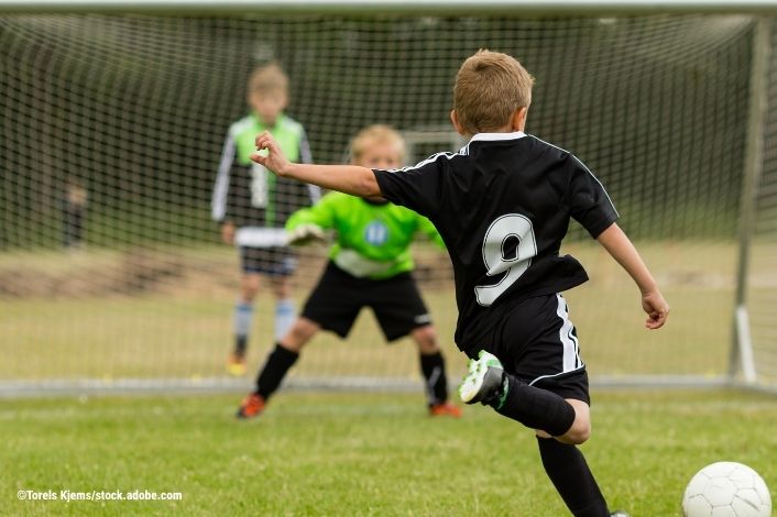Kids soccer penalty kick by Mikkel Bigandt