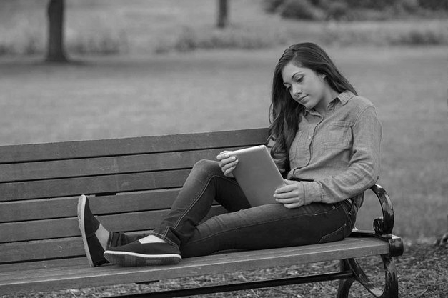 girl sitting on bench