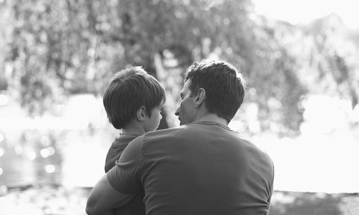 Father holding his son