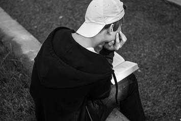 teen reading book