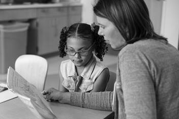 teacher with student