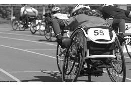 Runner in wheelchair.