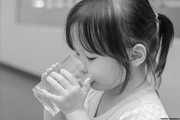 Image of a girl drinking water