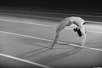 image of a gymnast tumbling