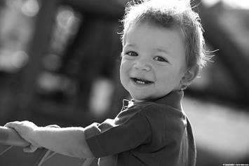 image of a smiling toddler boy