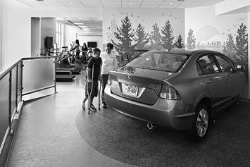 image of an inpatient rehab patient getting into a car