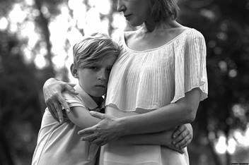 Mother and son hugging