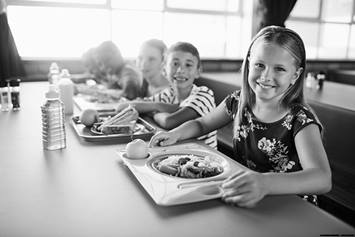 Children eating school lunch