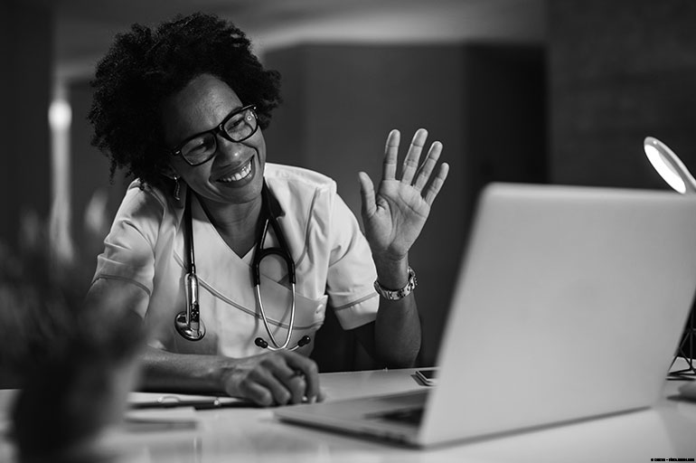 Medical professional conducting an exam via computer