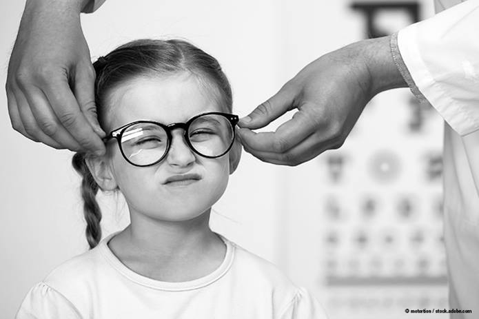 child wearing glasses