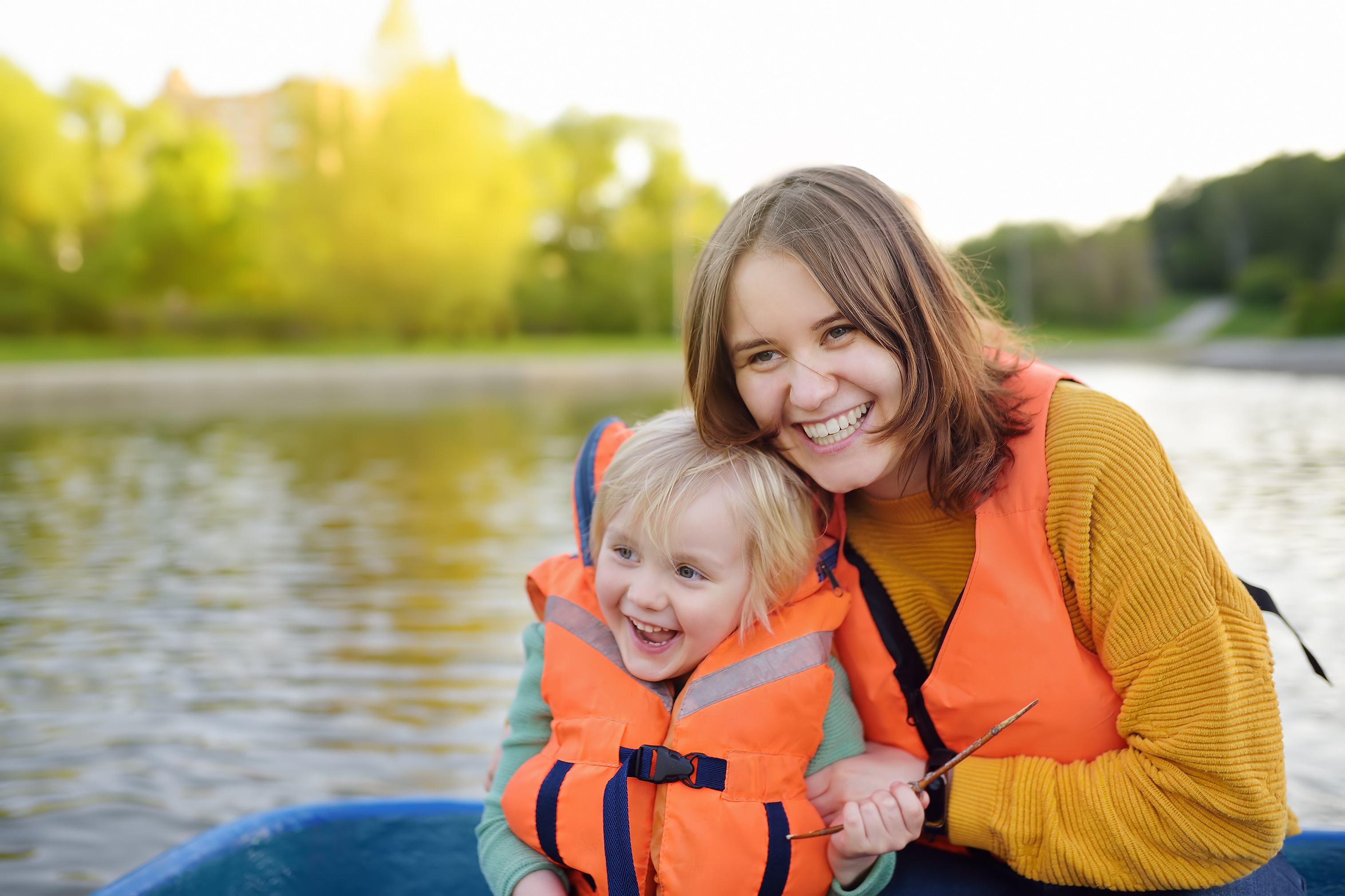mother and child by lake