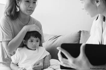 family talking to doctor