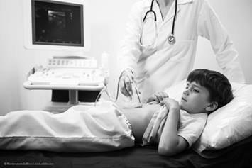 child in hospital bed