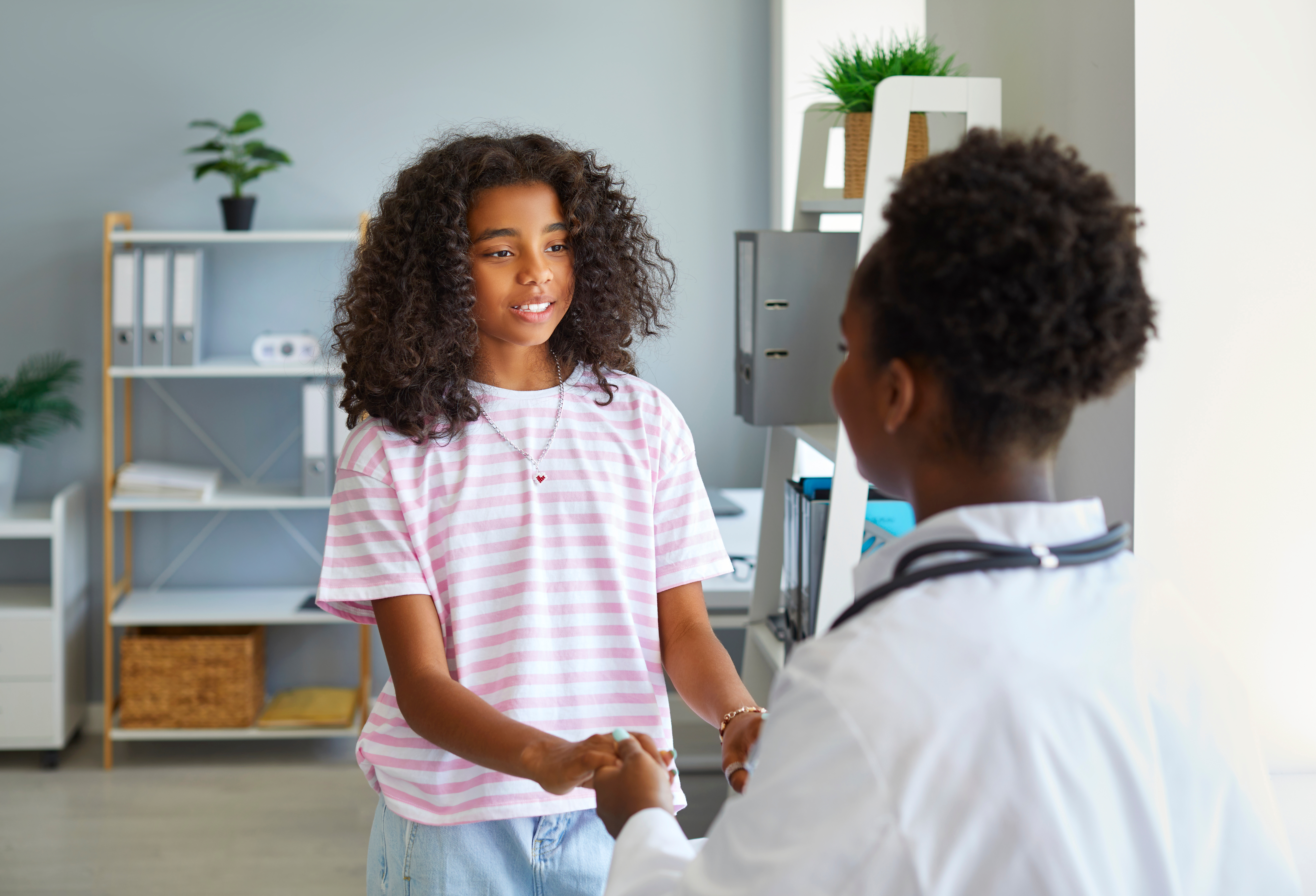 tween child talking to a doctor