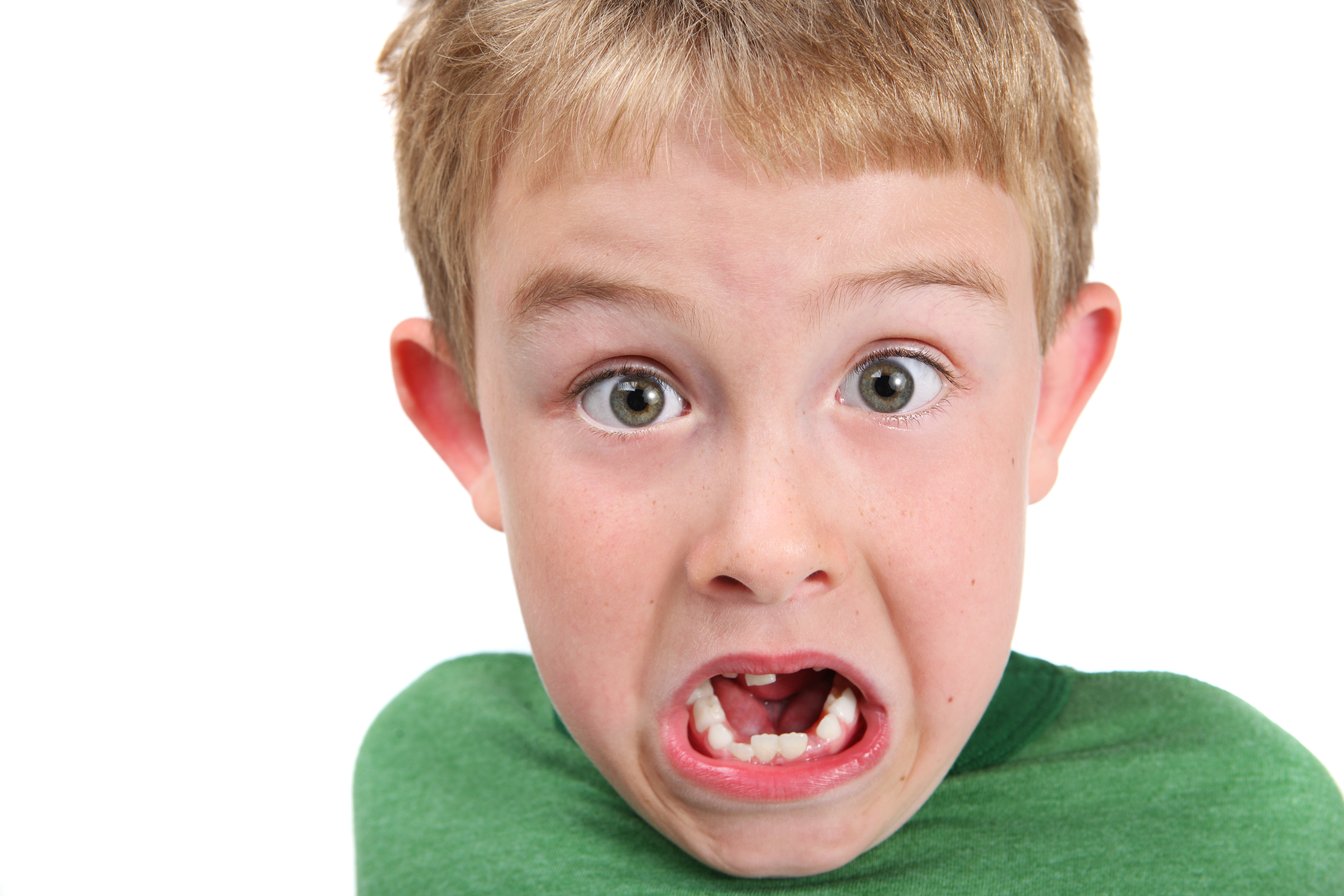 Young boy with mouth open