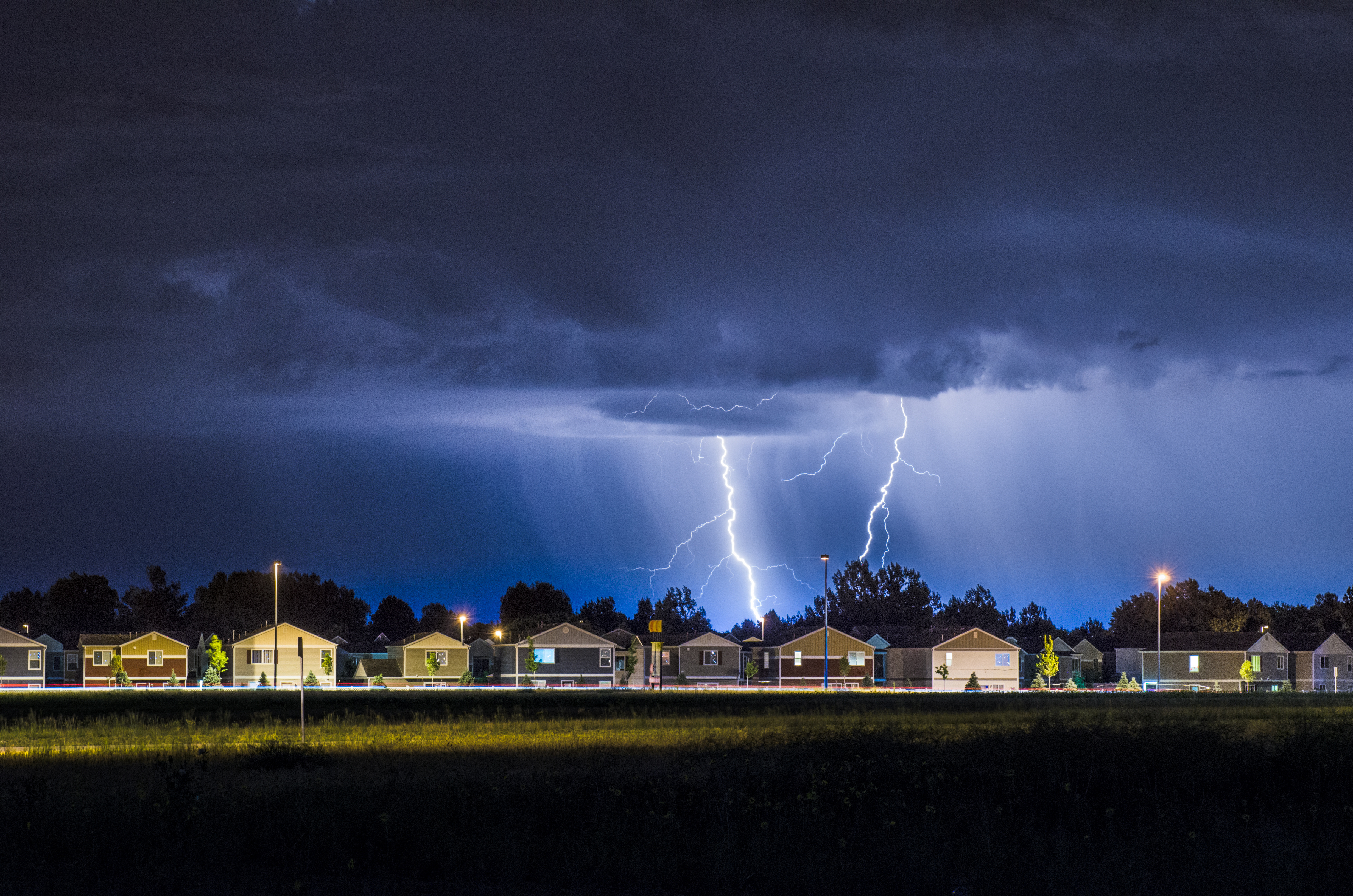 lightning and thunder clouds over a city
