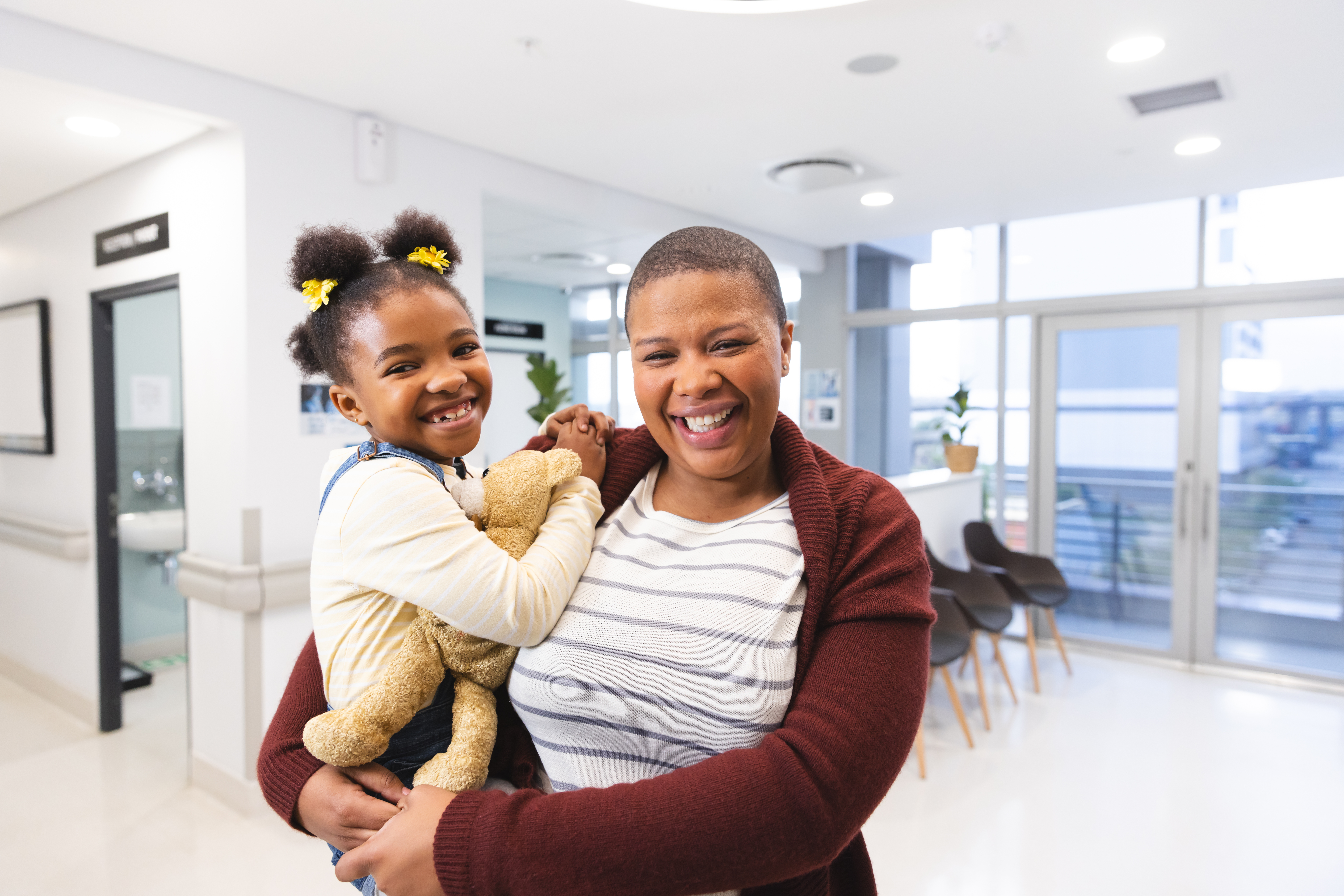 mother holding her child on her hip
