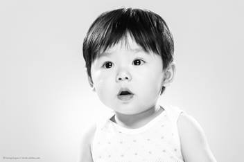 toddler looking concerned at the camera