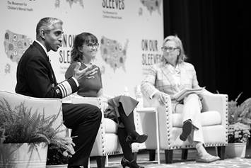 US Surgeon General speaks on stage with Ariana Hoet and Ann Fisher