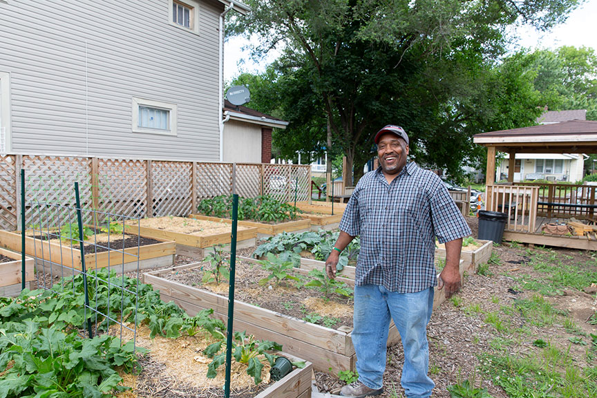 Aaron in the community garden
