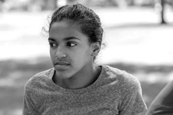 Tween Girl Reflecting While Standing Outside