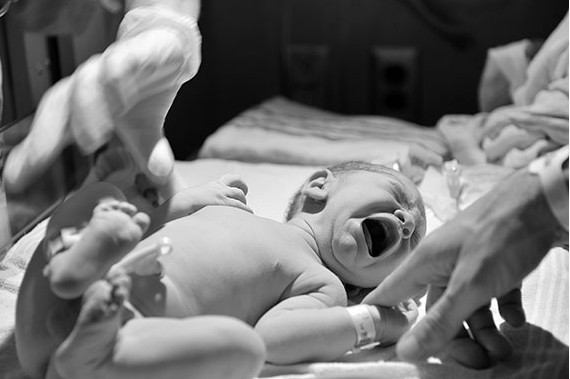 Infant baby crying during medical examination