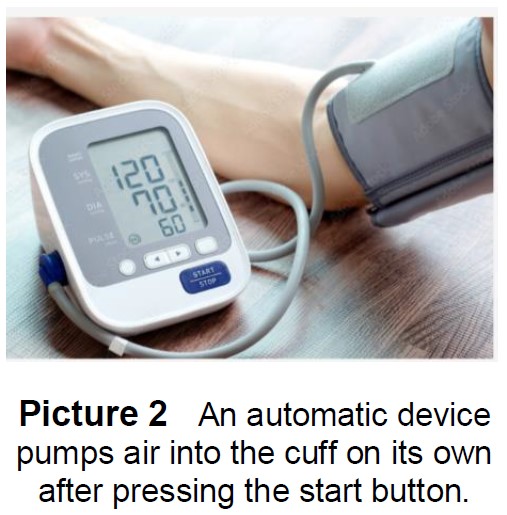 Automatic blood pressure monitor on person's arm