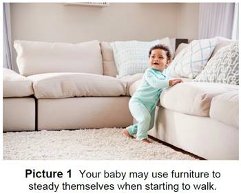 Baby using couch to help them walk