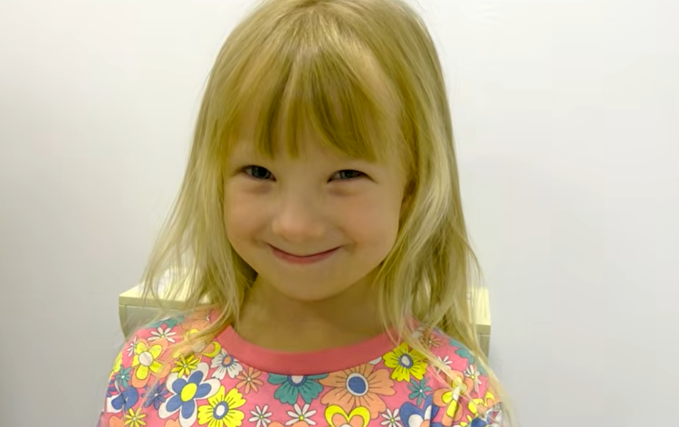 Ella smiling at camera