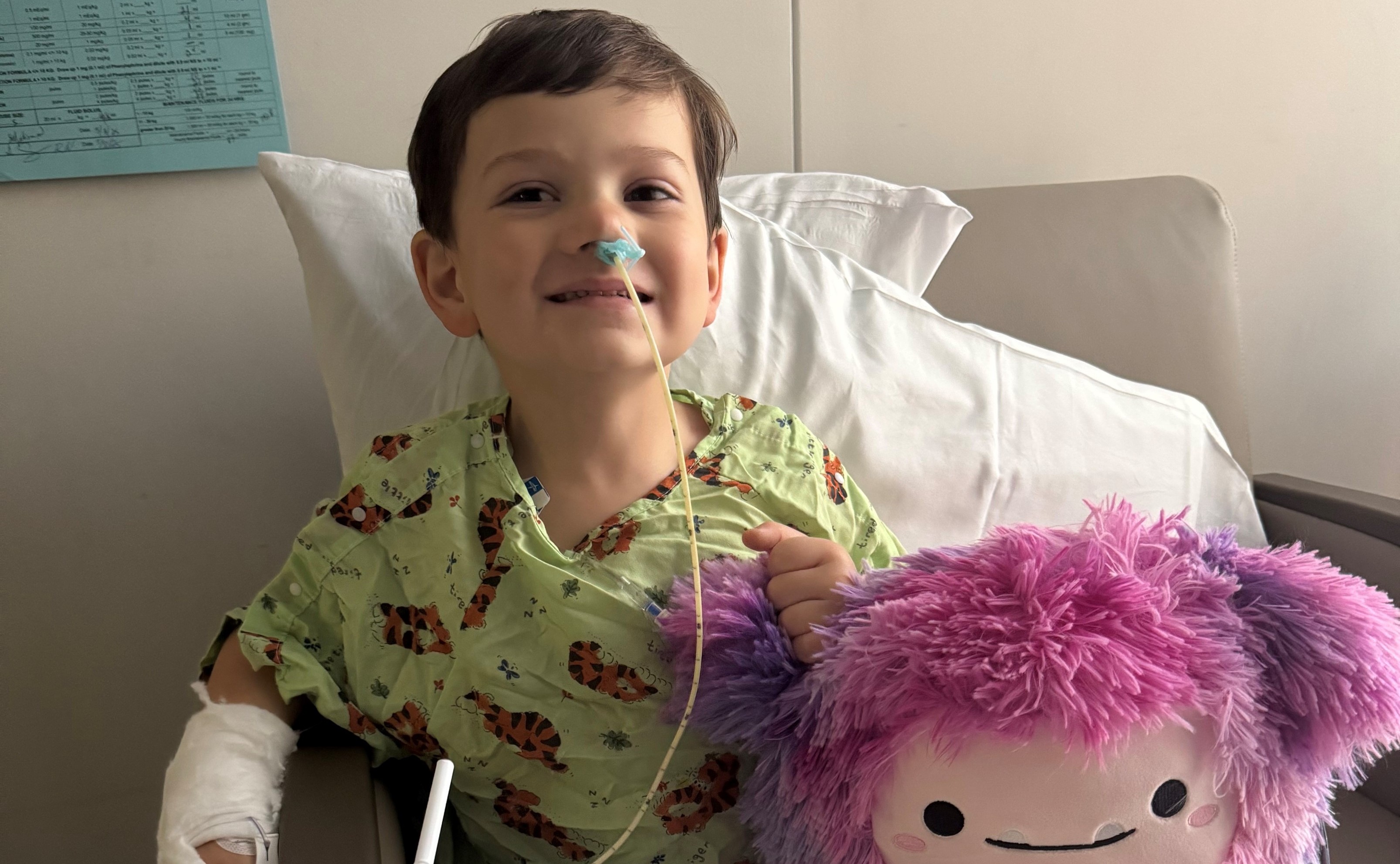 Oliver in a hospital bed