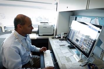 Vidu Garg at the computer