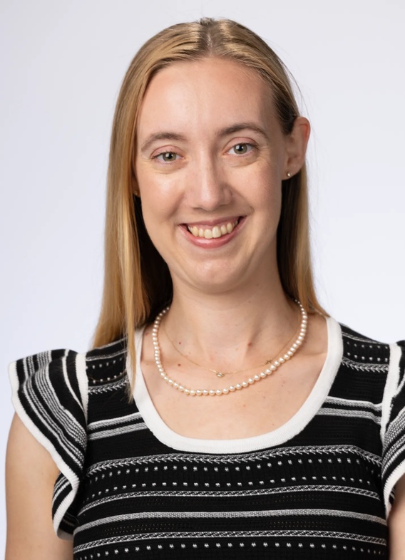 Portrait of Abigail Petrecca, woman with long blonde hair and a black shirt.