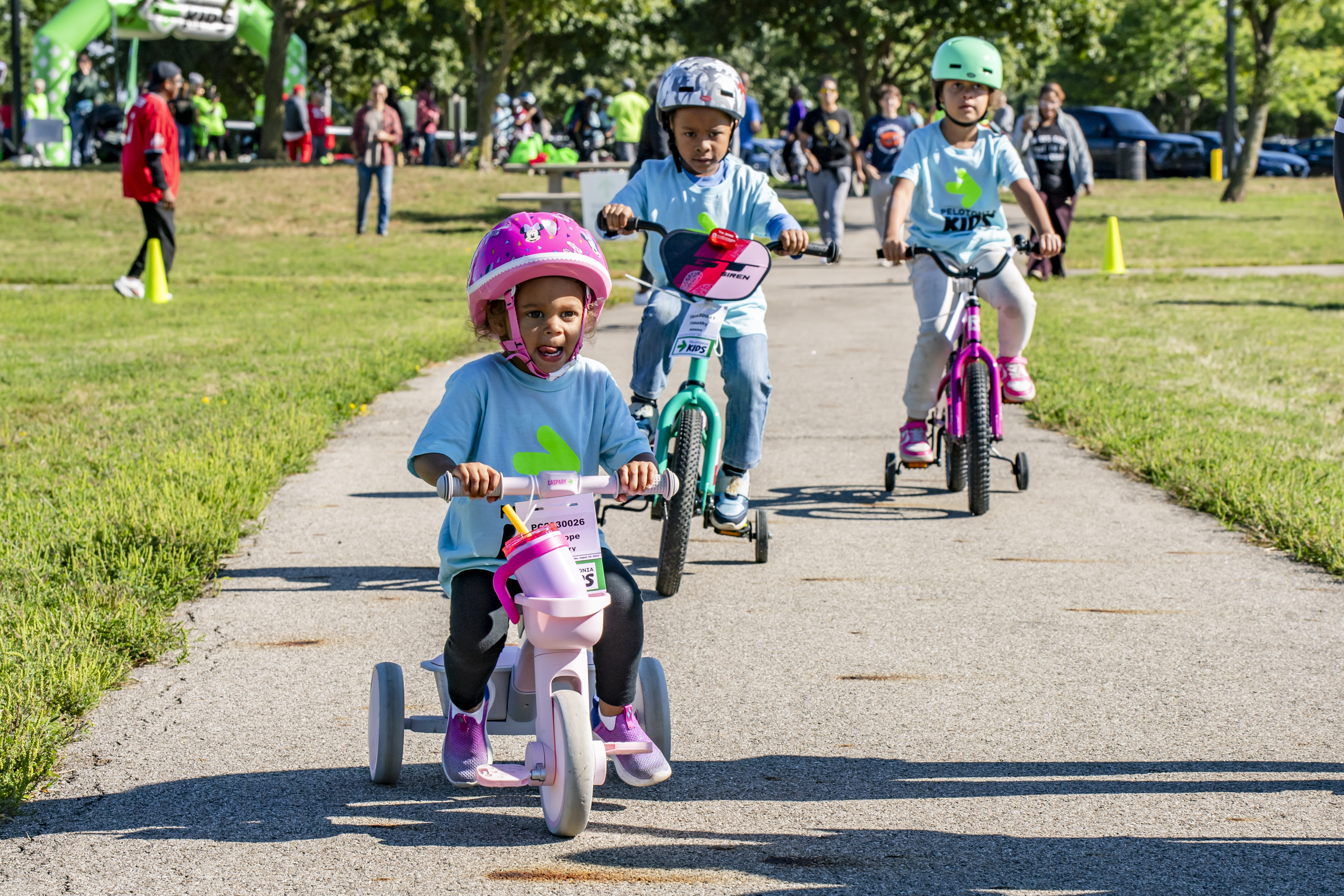 young girls riding bikes