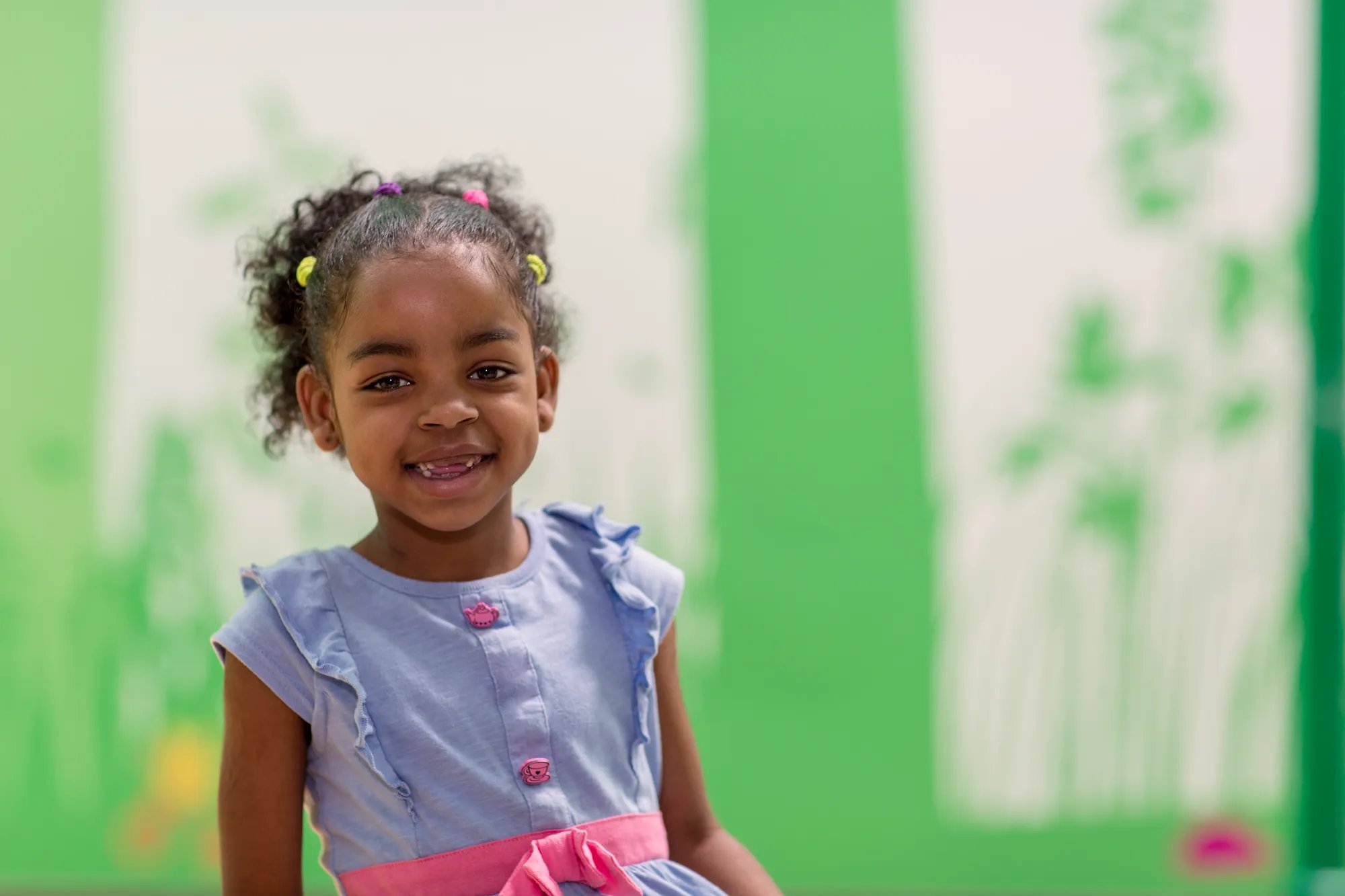 smiling girl patient missing teeth