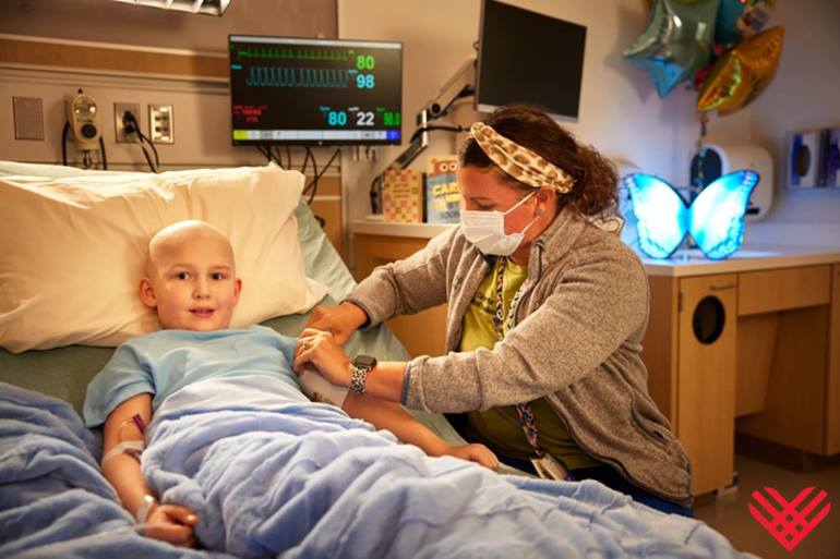 leukemia patient with nurse and nationwide children's butterfly