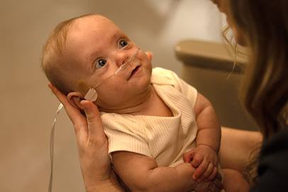 premature baby in mom's hands
