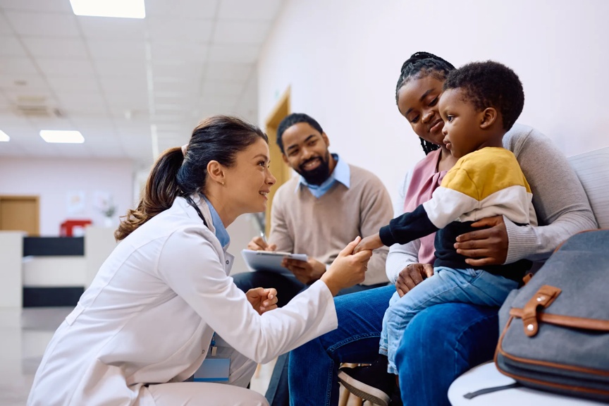 Doctor greeting a patient in the waiting room. 