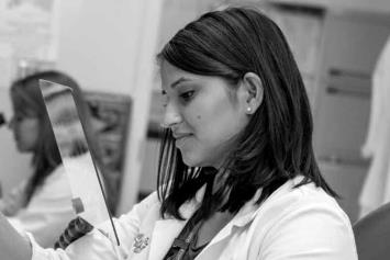 Female resident working in a research lab