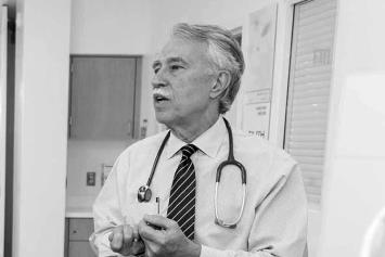 Two female and one male resident during rounds with Dr. Mahan