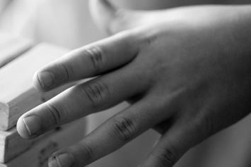 Child's Hands on Game