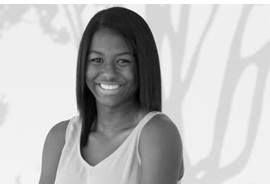 Teenage Girl Smiling in Hallway