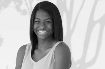 Teenage Girl Smiling in Hallway