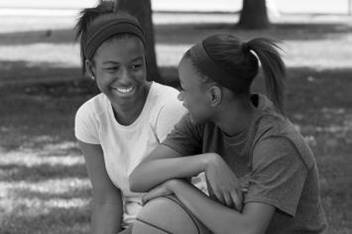 Teenage Girls Talking Outside