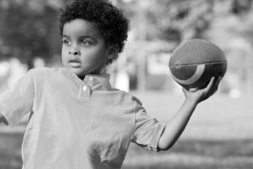 Boy Throwing Football