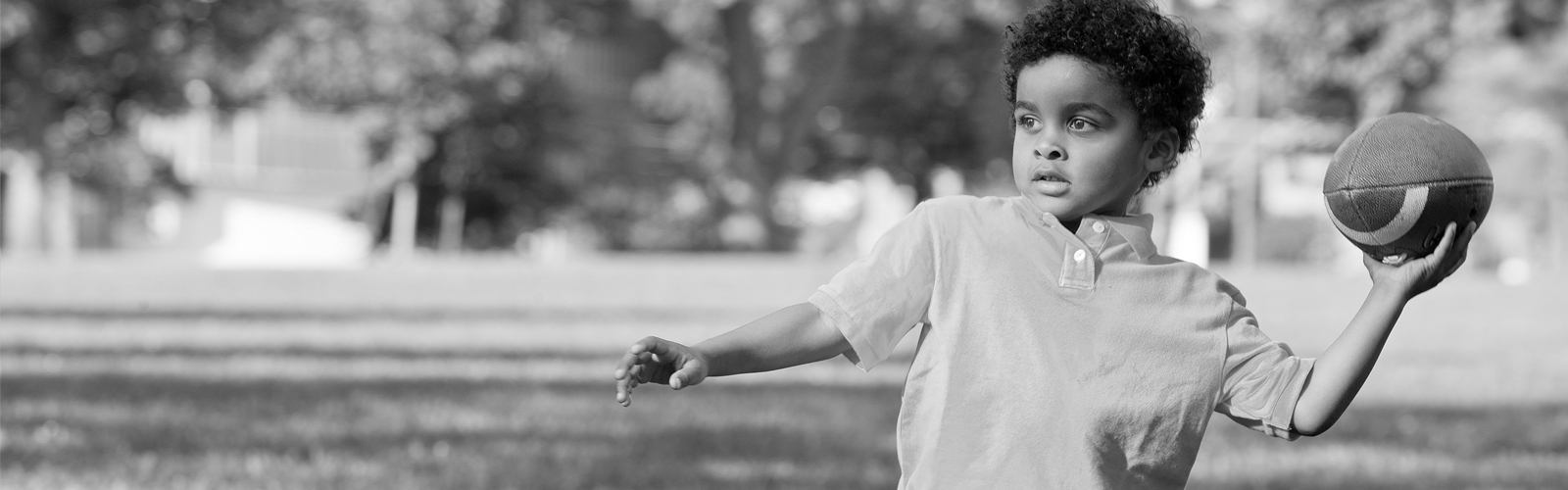 Boy Throwing Football