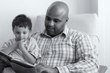 Dad and Son Reading Book
